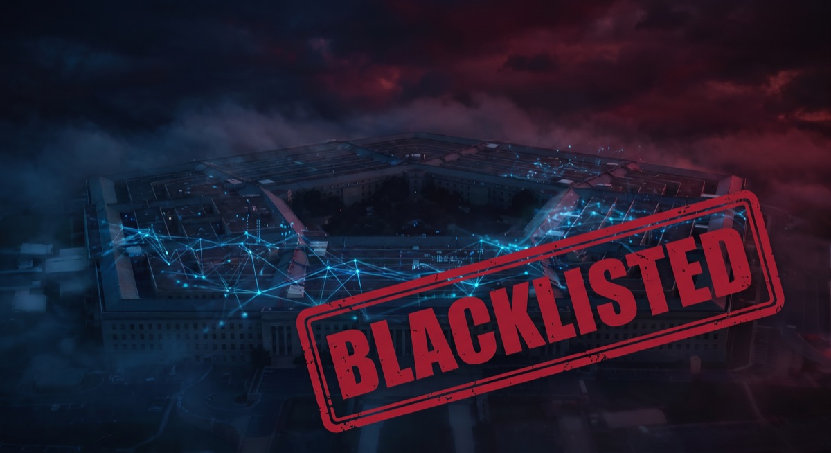 The Pentagon building at night overlaid with blue AI neural network patterns and a red BLACKLISTED stamp — representing the collision between artificial intelligence and national security